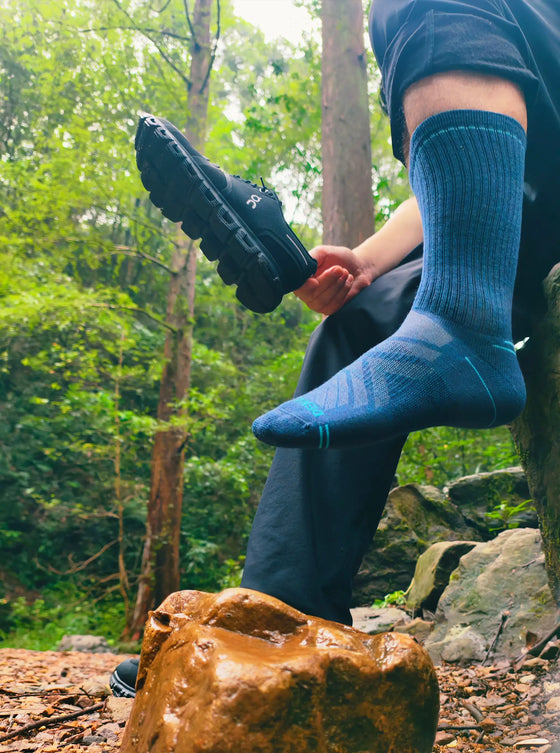 DENALISE navy crew socks worn during a woodland hiking break